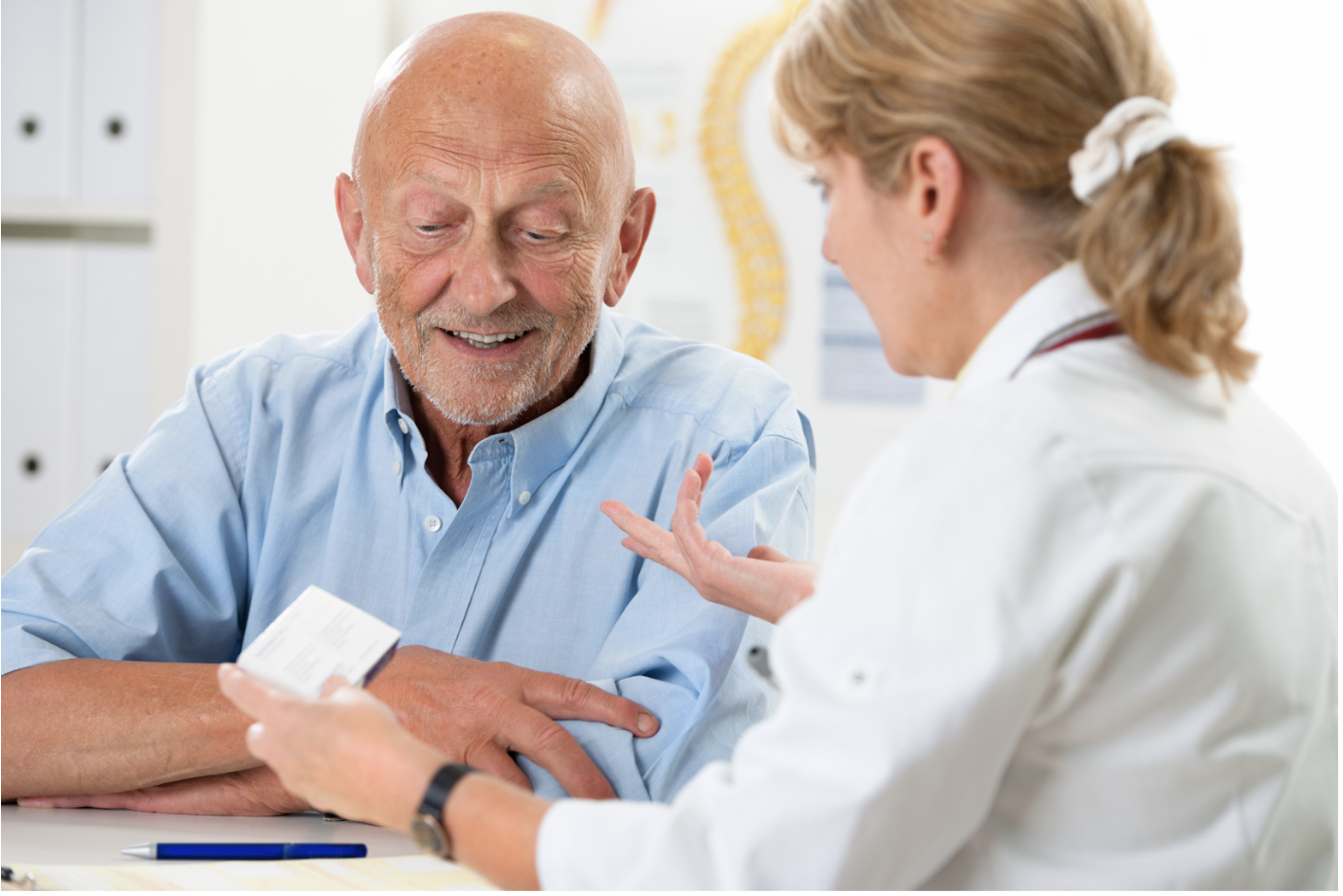 Doctor consulting with patient